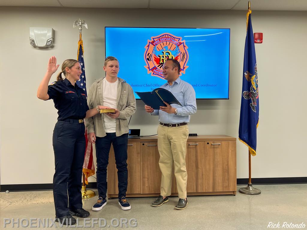 Community Outreach Coordinator Sarah Menage being sworn in by Mayor Pete, with Firefighter Trainee Erick Peirce